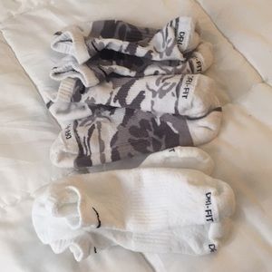 8 pairs of Nike socks. 7 are dri fit. Like new.